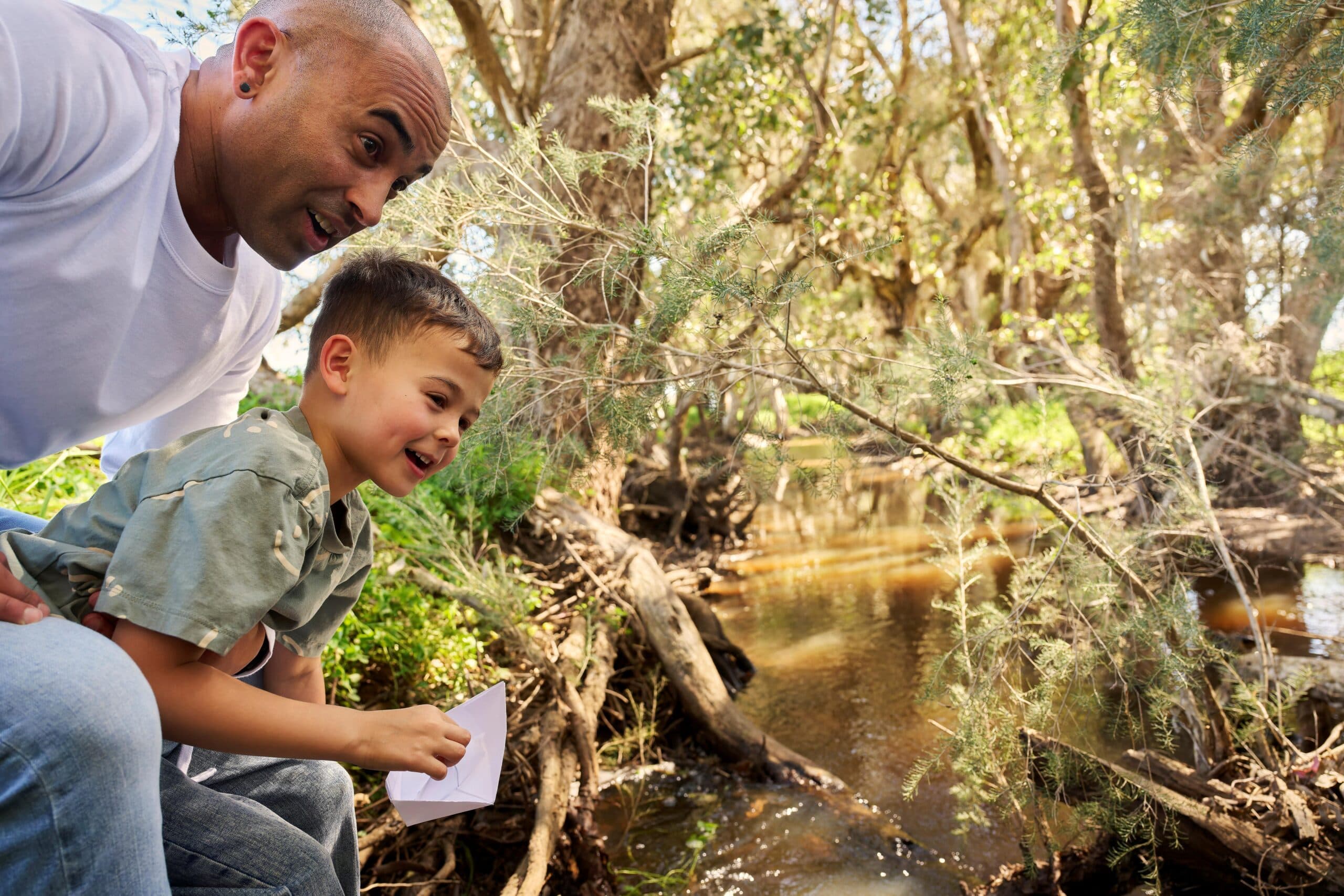 Father and Son with Origami Boat at Manjedal Brook in Taylor Springs, Mundijong